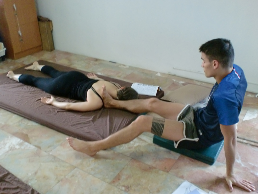 shoulder massage with foot