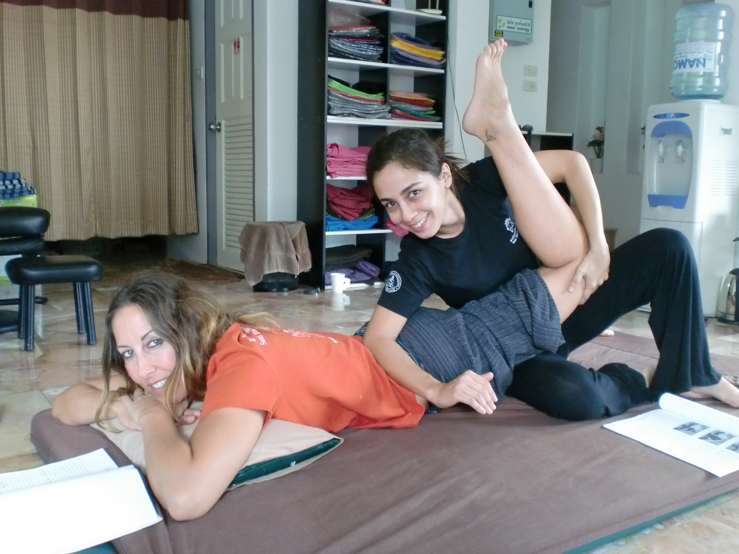 massage lower back with elbow